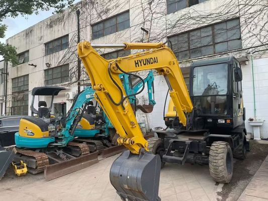 Une mini-excavatrice à roues Hyundai R60W-7 utilisée stable et efficace